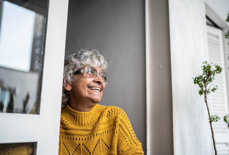 woman in mustard jumper